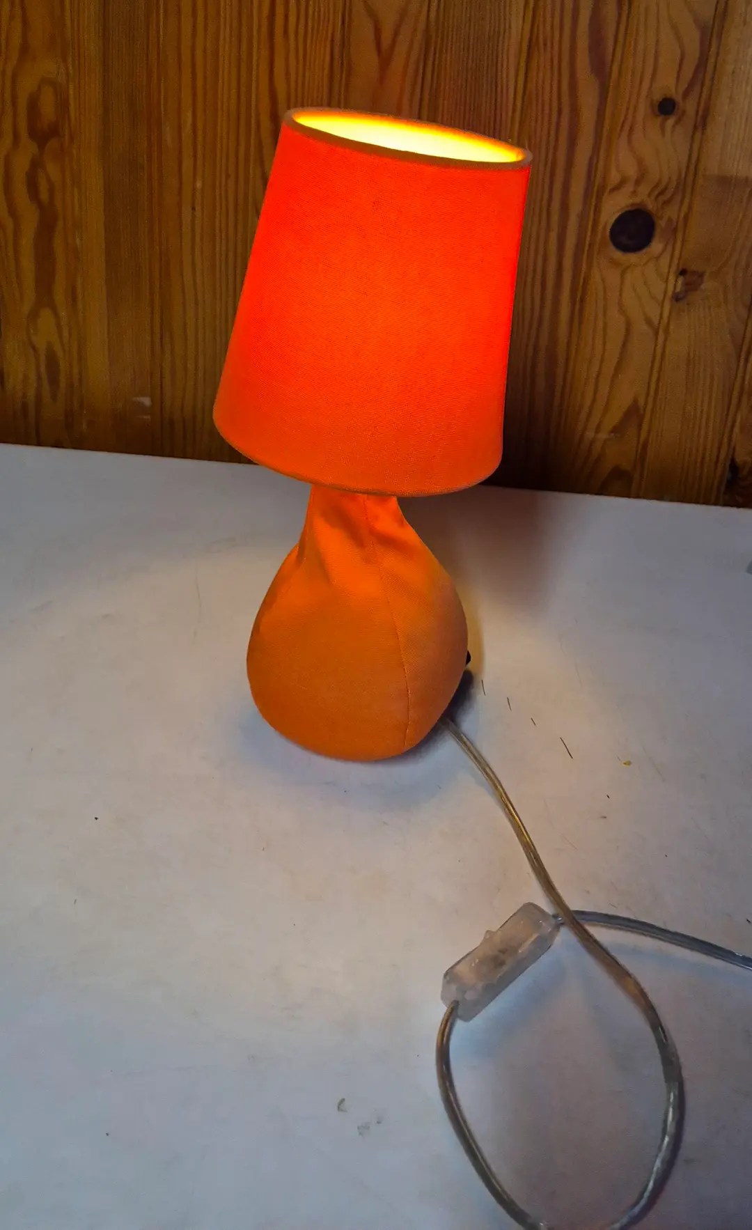 Lampe à poser avec abat jour Lichtsack pied lesté tissu orange