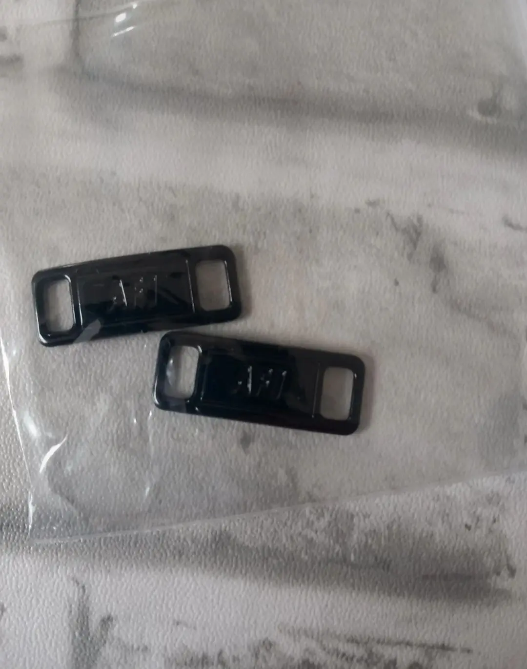 Nike Air Forceones lace tags in black