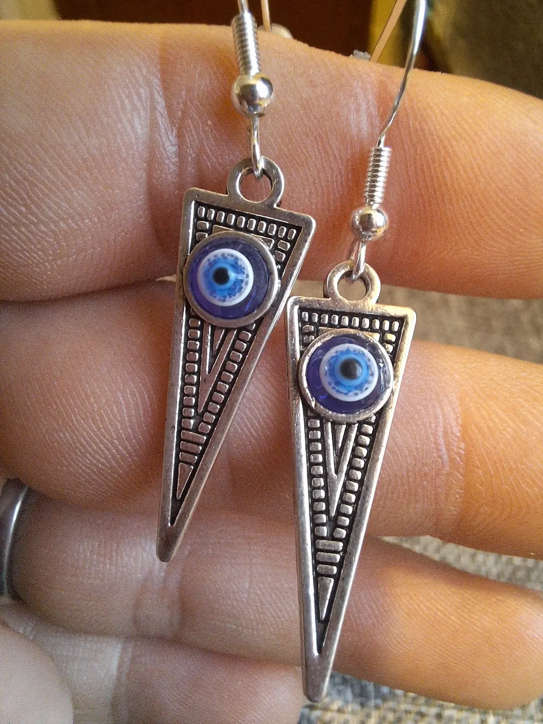 Silver hooks earrings with evil 🧿 eyes charm 