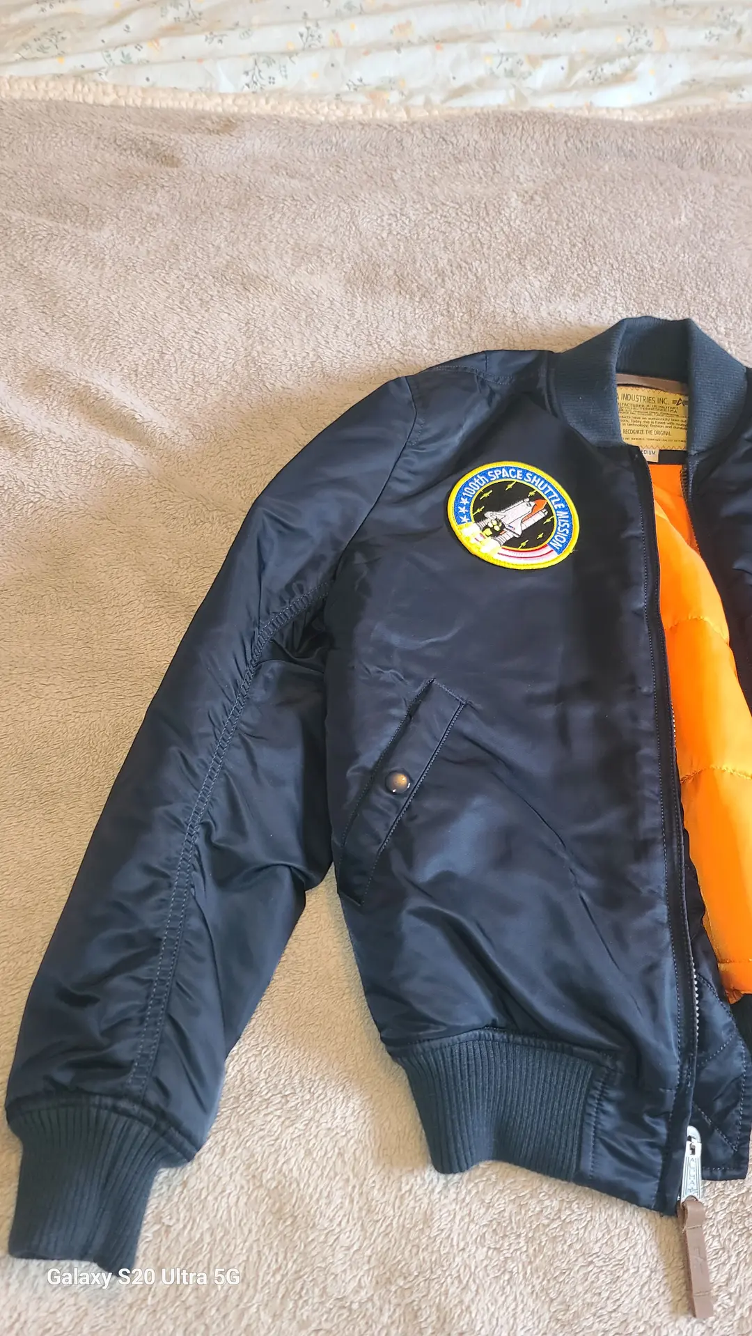 Veste bombers Nasa Alpha Industrie 1ère Série Original ( bleu marine et orange à l'intérieur ) 