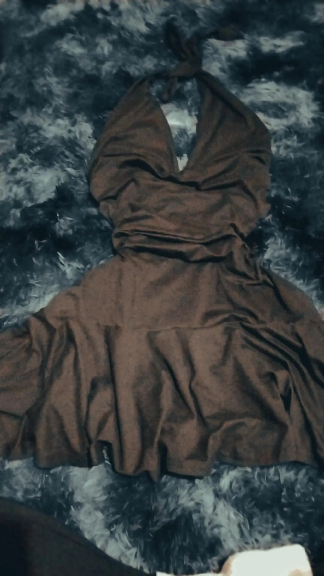 Black mini dress with V-neck and flared skirt